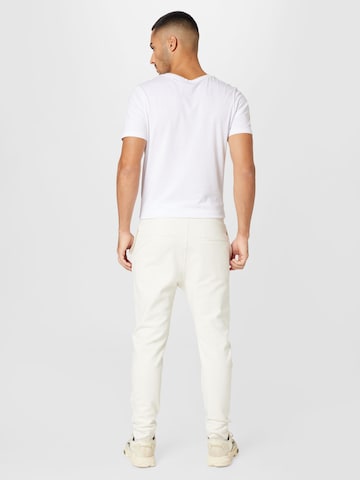 TOM TAILOR DENIM Tapered Broek in Beige