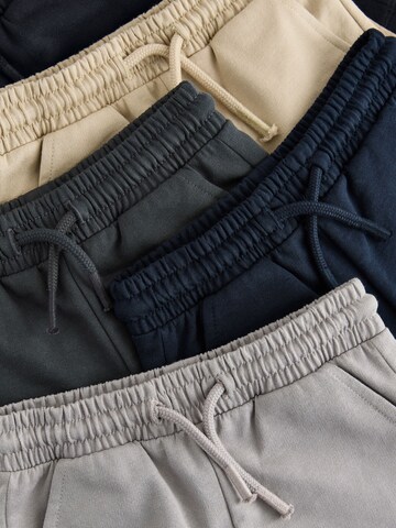 Next Normální Kalhoty – béžová