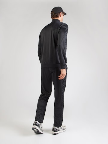 juoda Reebok Treniruočių kostiumas 'ZEN CUT AND SEW'