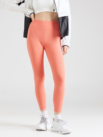 DKNY Performance Skinny Workout Pants in Orange: front