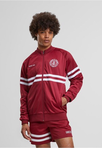 Unfair Athletics Between-season jacket in Red: front