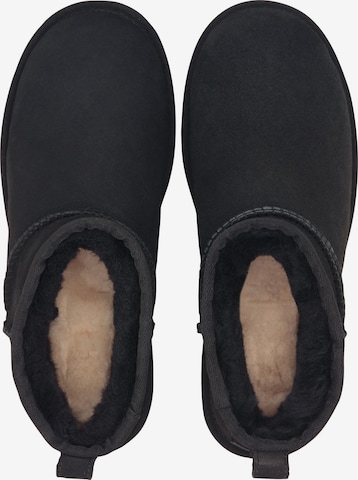 UGG Talvisaappaat 'Classic Ultra Mini' värissä musta