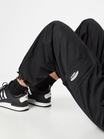 ADIDAS ORIGINALS Ohlapna forma Kargo hlače | črna barva