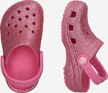 Chaussures ouvertes Crocs en rose