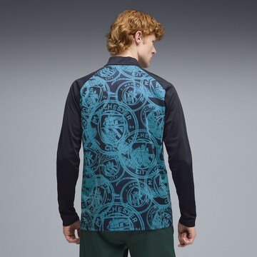 T-Shirt fonctionnel 'Manchester City' PUMA en bleu