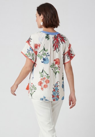 Usha - Blusa en blanco
