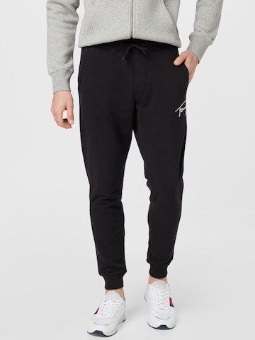 Tommy Jeans Tapered Trousers in Black: front