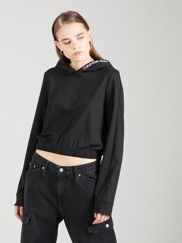 Sweat-shirt Calvin Klein Jeans en noir : devant