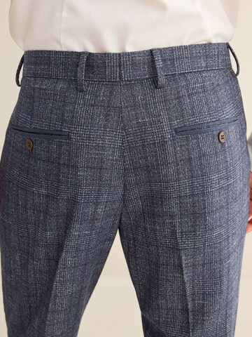 Coupe slim Pantalon à plis Next en bleu