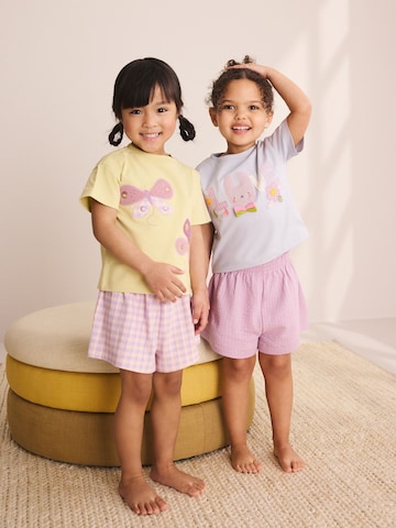 Next - Pijama en amarillo: frente