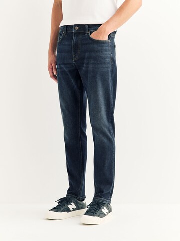 Coupe slim Jean 'Motion Flex' Next en bleu