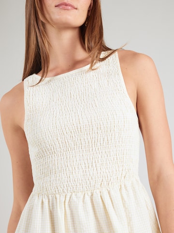 QS - Vestido en amarillo
