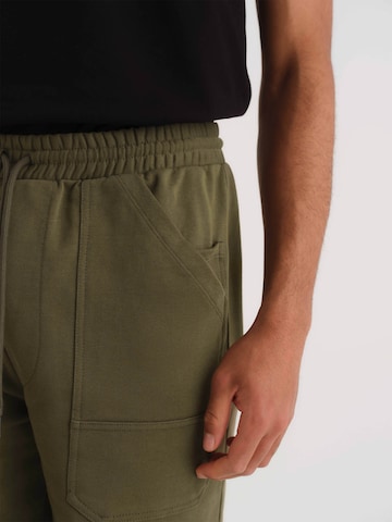 ABOUT YOU x Kevin Trapp Regular Pants 'Jonathan' in Green
