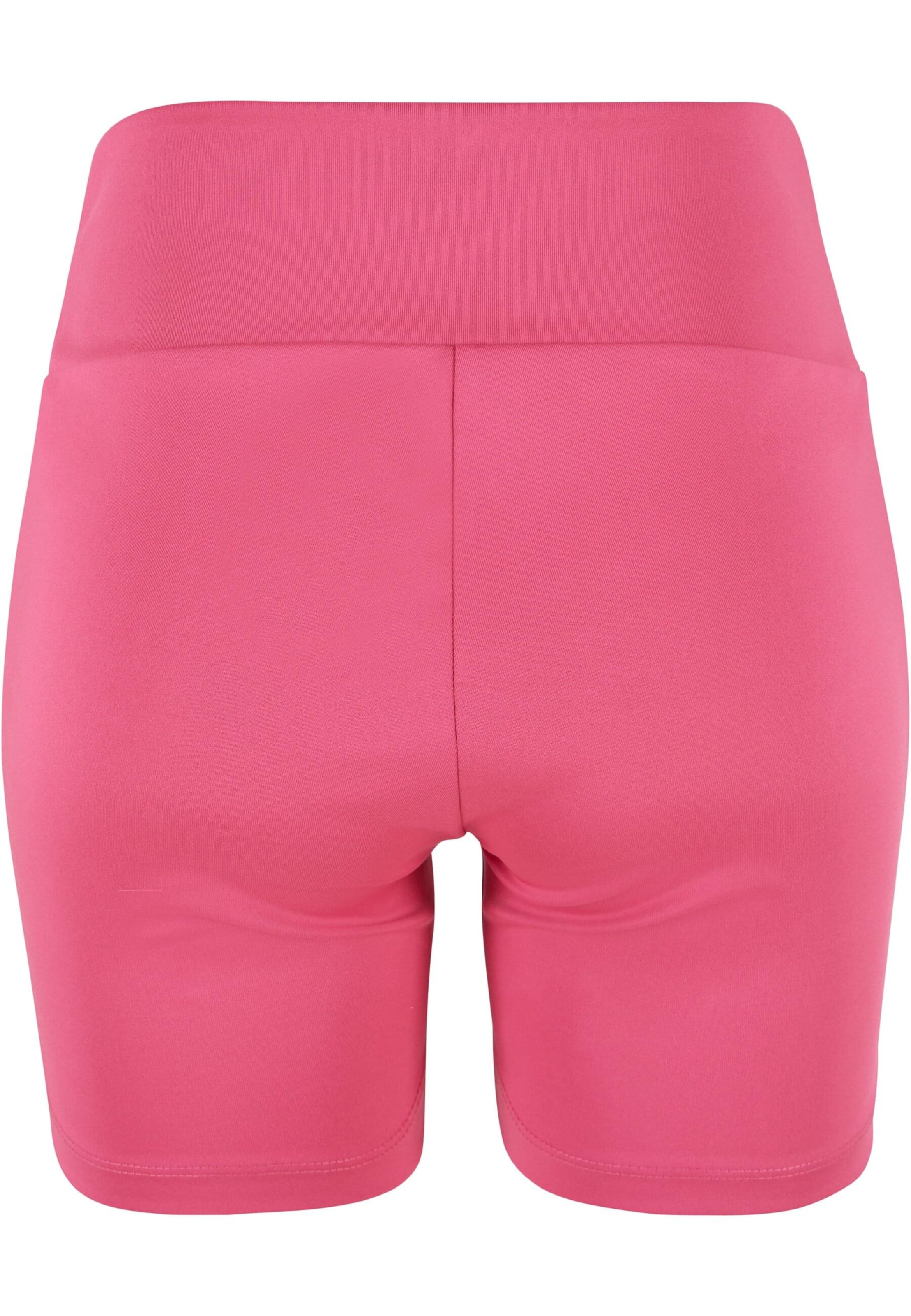Skinny Pantaloni sportivi di Karl Kani in rosa