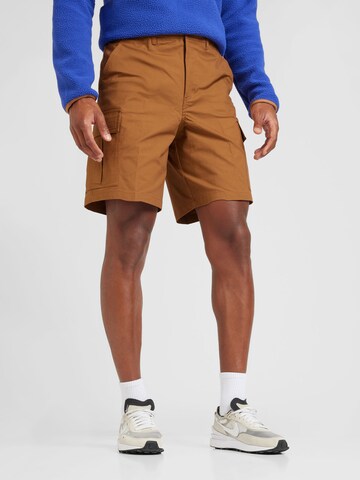 Nike Sportswear Normalny krój Bojówki 'CLUB' w kolorze brązowy: przód