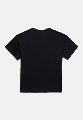 Nike Sportswear - Camiseta en negro: atrás