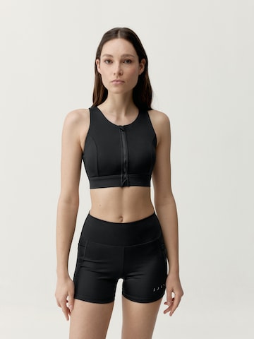 Skinny Haut de sport 'Eider' Born en noir : devant