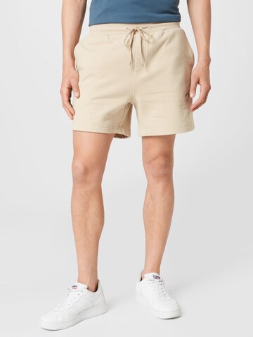 Tommy Jeans Loose fit Pants in Beige: front