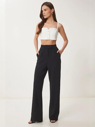 Happiness İstanbul Loose fit Pleat-front trousers in Black