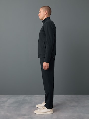 Next Slimfit Spodnie w kant w kolorze niebieski