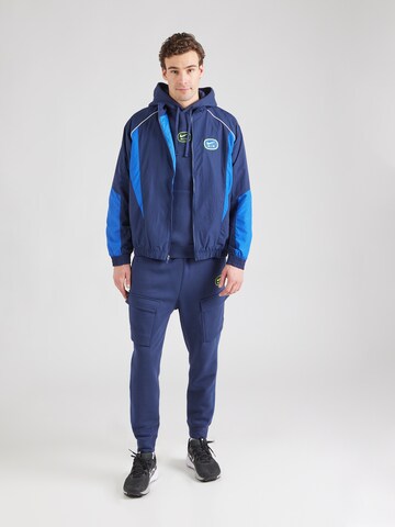 Nike SportswearPrijelazna jakna 'AIR' - plava boja