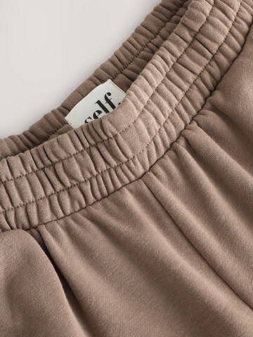 Wide leg Pantaloni de la self. pe maro