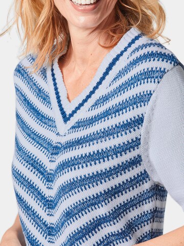 Goldner Pullover in Blau