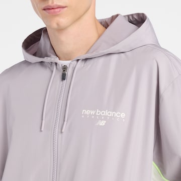 new balance Tussenjas 'Trackside Woven Jacket' in Grijs