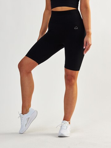 BeShaped Skinny Workout Pants 'Body Boost' in Black: front