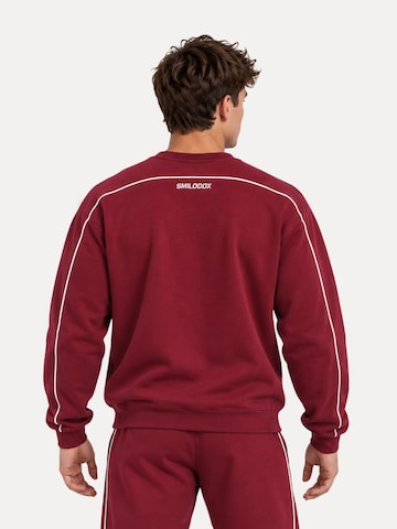 Sweat-shirt 'Brenvaro' Smilodox en rouge