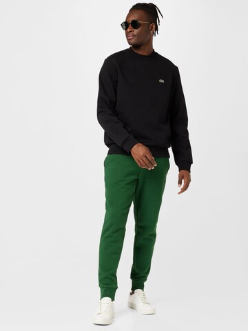 LACOSTE Sweatshirt i sort