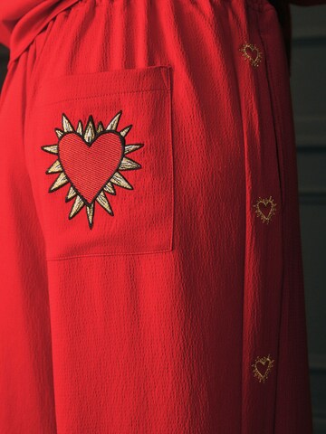 Pijama de la Rockett St George pe roșu