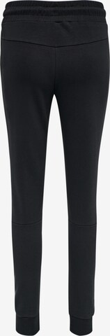 Coupe slim Pantalon de sport Hummel en noir