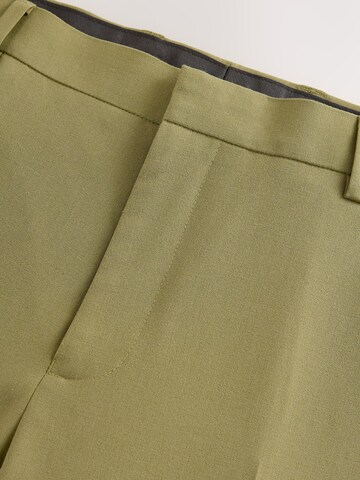 Skinny Pantalon à plis Next en vert