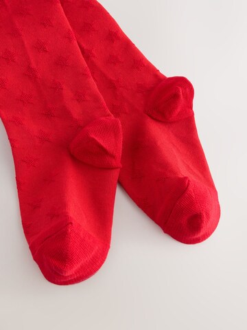 Next - Leotardos en rojo