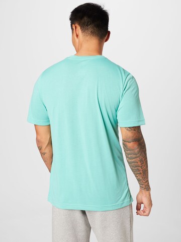 T-Shirt fonctionnel Reebok en bleu