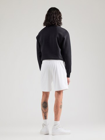 regular Pantaloni di Nike Sportswear in bianco