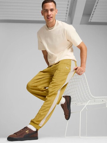 PUMA Regular Sporthose ' The NeverWorn IV T7' in Gelb