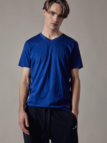 Maglietta 'T-Shirt Scollo a V' di OWN Off With Nature in blu