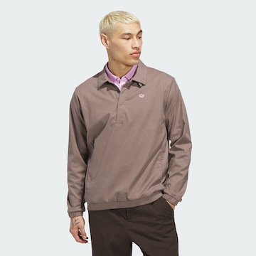 Veste de sport ADIDAS PERFORMANCE en marron : devant