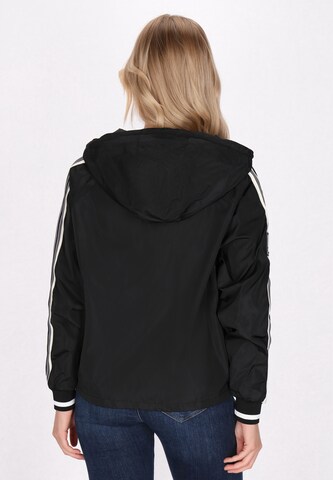 urban rain by Schmuddelwedda Between-season jacket in Black