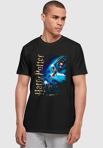 ABSOLUTE CULT T-Shirt 'Harry Potter - Harry Smiles At Hogwarts' in Schwarz: Vorderseite