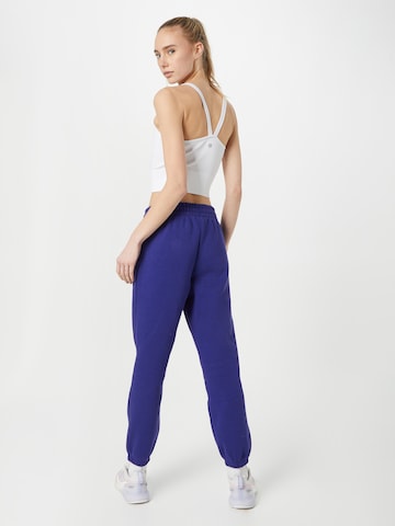 UNDER ARMOUR Tapered Sportbroek 'Essential' in Blauw