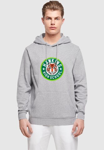 Sweat-shirt 'Stranger Things - Hawkins Tiger Circle' ABSOLUTE CULT en gris : devant