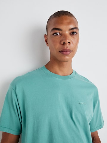 LEVI'S ® T-Shirt 'Red Tab' in Grün