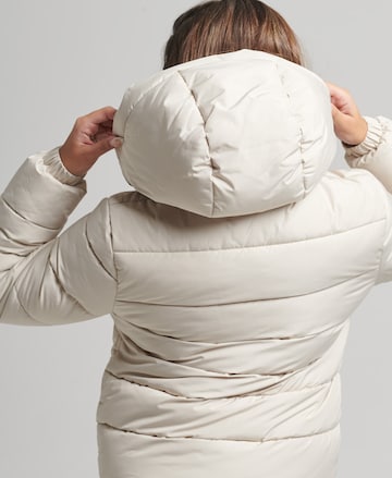 Superdry Zimní bunda – béžová