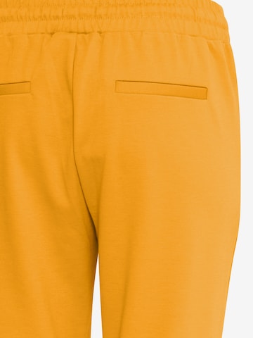 Slimfit Pantaloni con pieghe 'KATE' di ICHI in giallo