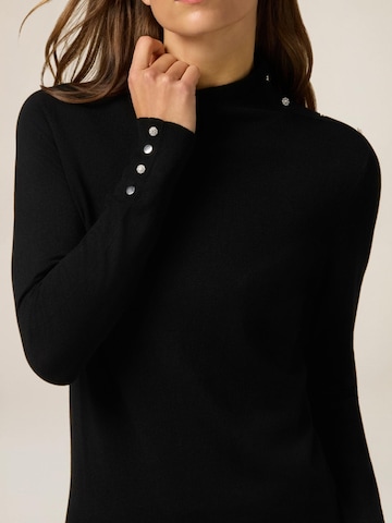 Pullover di oltre in nero