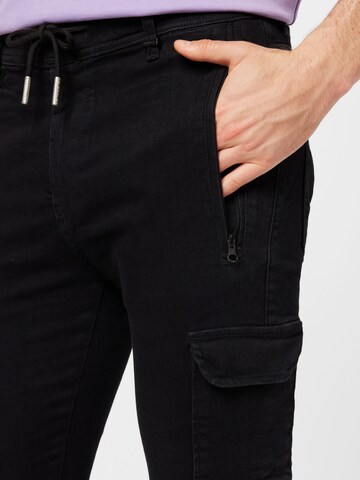 Elias Rumelis - Tapered Pantalón vaquero cargo en negro