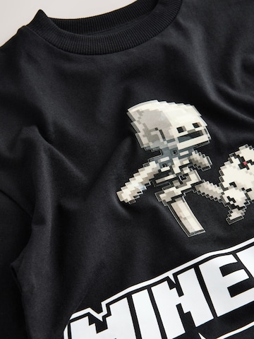 Next T-shirt i svart